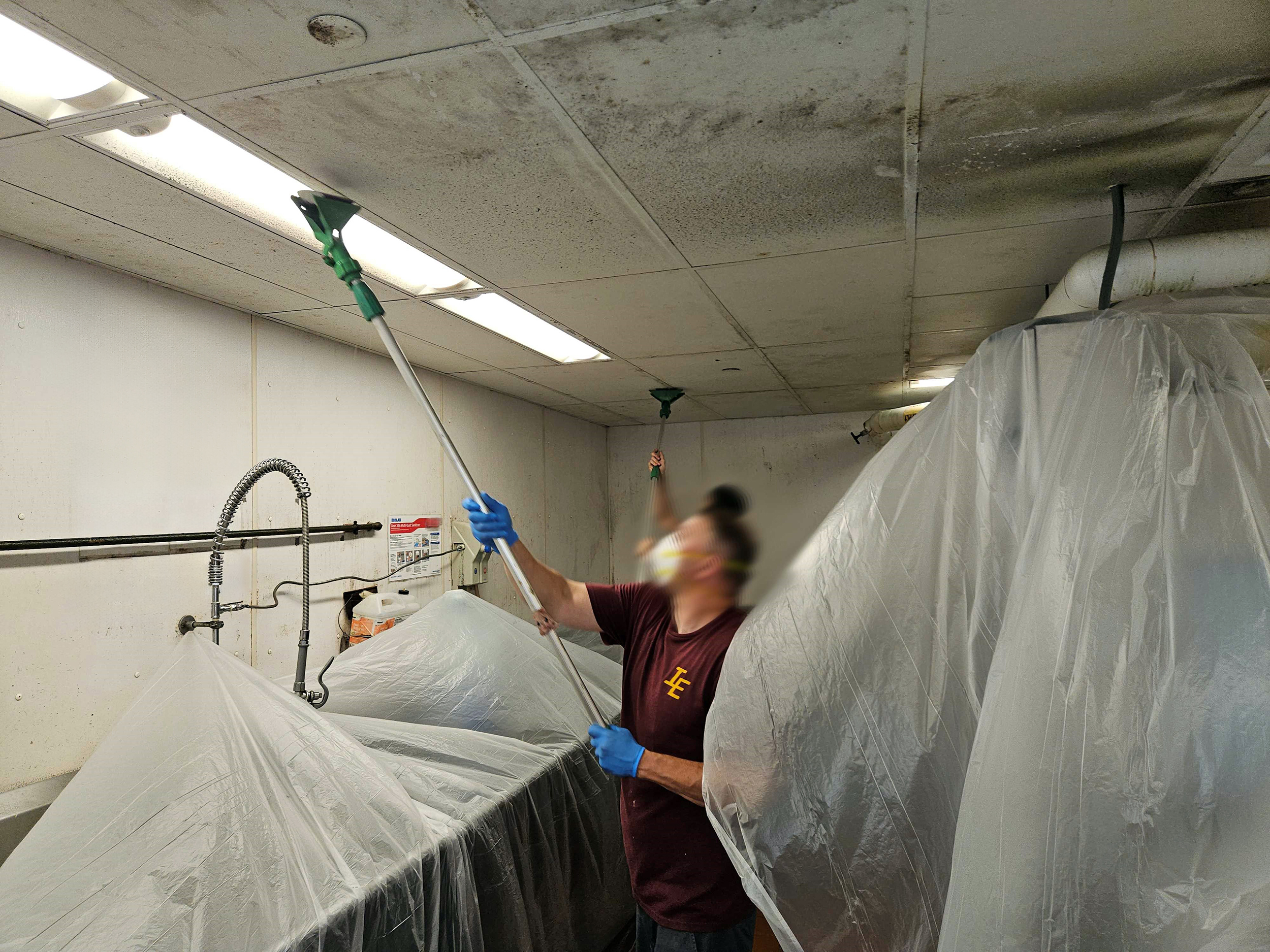 Cleaning a kitchen ceiling