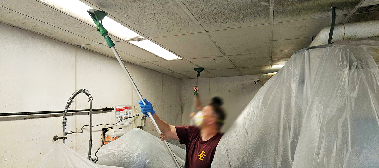 Cleaning a kitchen ceiling